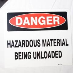 Hazardous Material Being Unloaded Sign