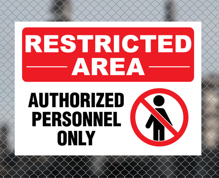 Restricted Area Sign on a Fence
