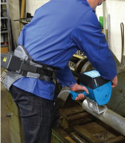 Man using blue handheld metal marking machine